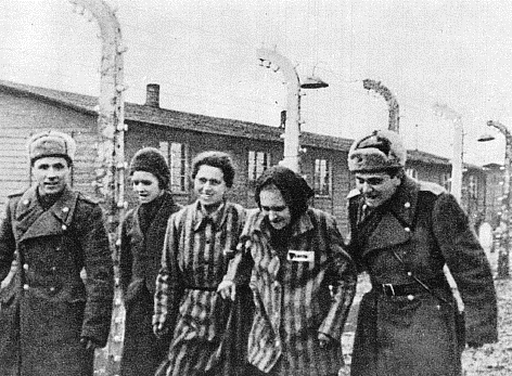 Russian soldiers with survivors of Auschwitz